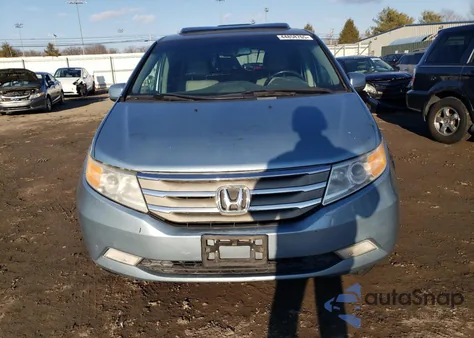 2011 Honda Odyssey Exl z USA, uszkodzony, nr VIN 5FNRL5H61BB030360